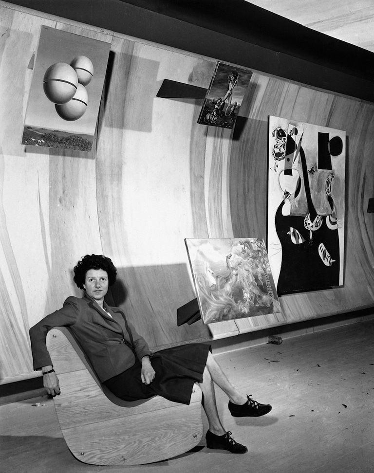 Peggy Guggenheim poses in her New York gallery Art of This Century, October 22, 1942